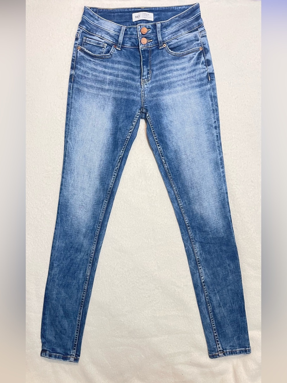 BKE Women's Skinny Jeans in Light Blue Wash 27” waist x 31 1/2” inseam.